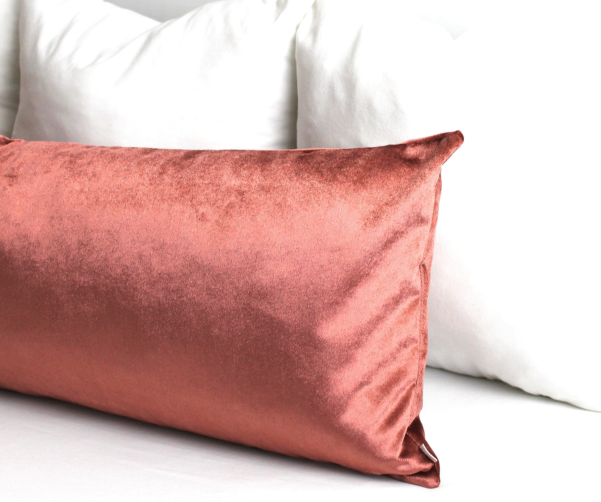 Premium velvet pillow covers in coral. Introduce luxe texture into your space with the Coral Premium Velvet Throw Pillow Cover. Made from luxuriously soft, salmon-colored velvet, this pillow cover adds a cozy, inviting feel to any setting. It's the perfect accessory to make your space stand out.