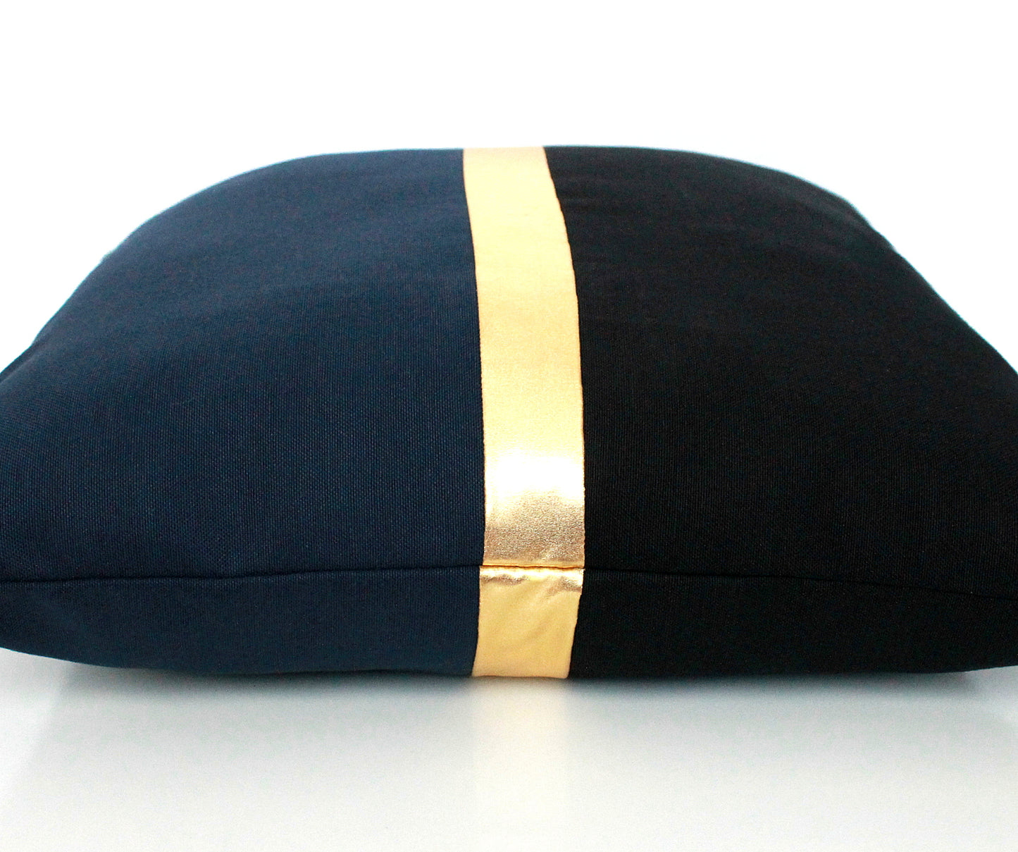 These affordable pillow covers are a must if you are looking for a touch of elegance in your home. The navy blue and black cotton is made to pop with a custom stripe of silver, gold or copper.