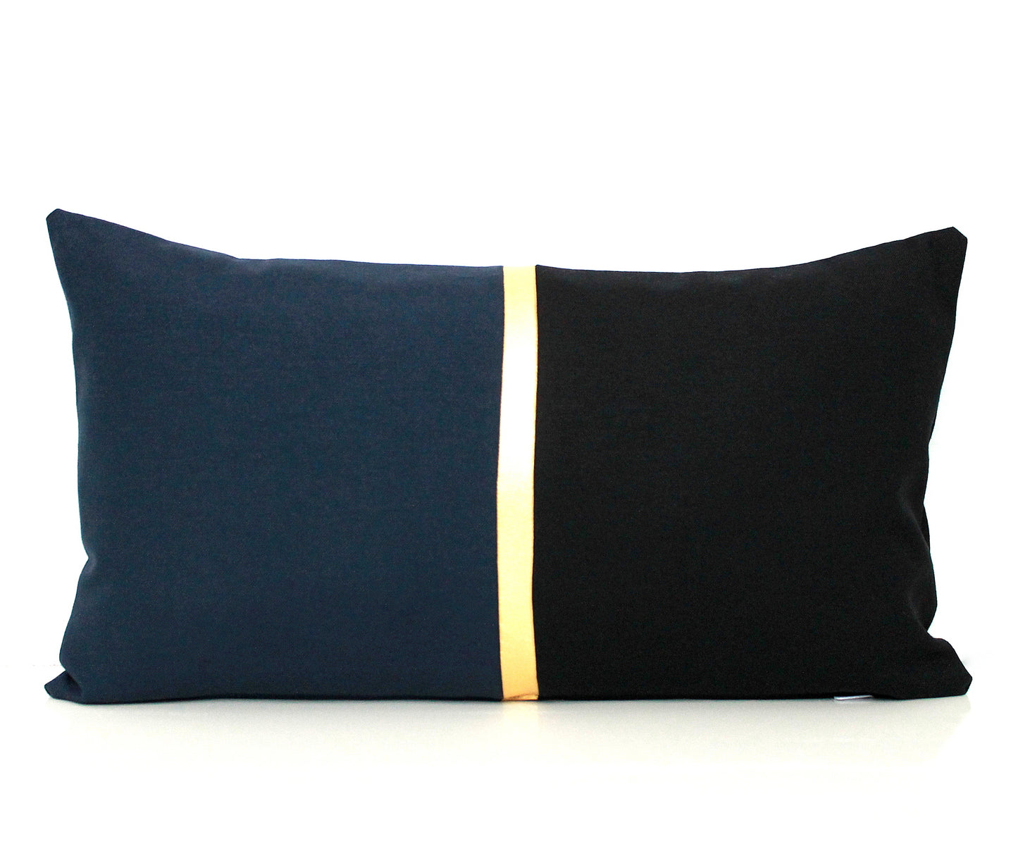 These affordable pillow covers are a must if you are looking for a touch of elegance in your home. The navy blue and black cotton is made to pop with a custom stripe of silver, gold or copper.