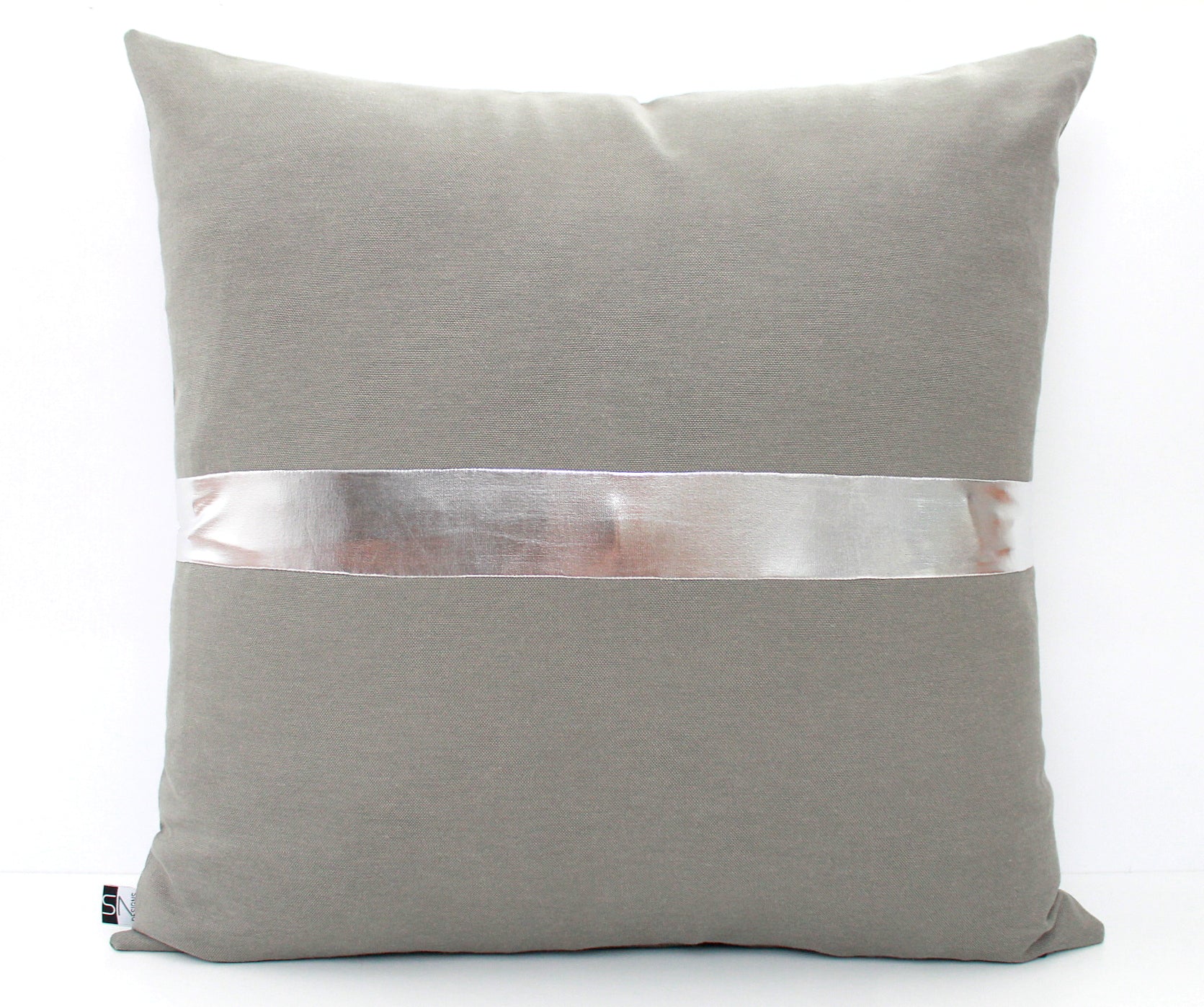 These affordable pillow covers are a must if you are looking for a touch of elegance in your home. The dark grey cotton is made to pop with a custom stripe of silver, gold or copper.